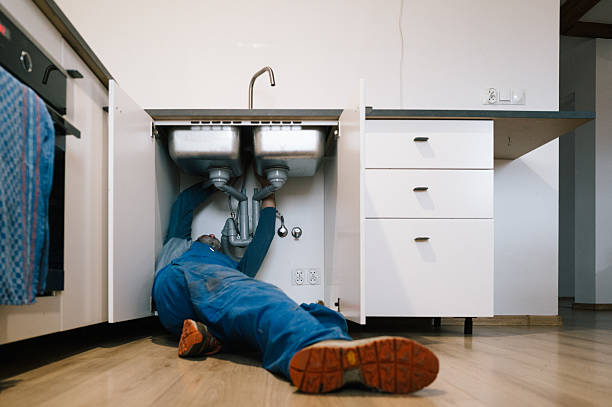 Professional Plumbing technician working in Bondurant, IA